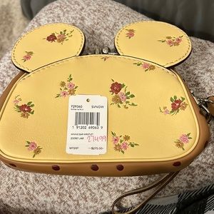 Coach
New with Tags
KISSLOCK WRISTLET WITH FLORAL MIX AND MINNIE MOUSE EARS